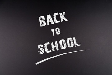 Back to School written on Blackboard, simple text, concept