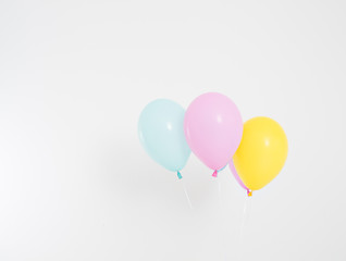 Fototapeta na wymiar Colorful party balloons background. Isolated on white. Copy space
