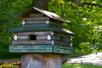birdhouse in the form of a wooden house