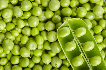 Peas pod and peal of peas. Close up.