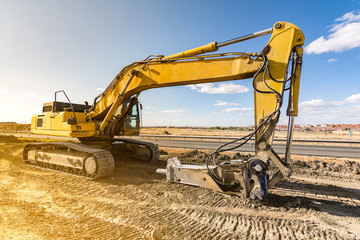 Hydraulic hammer in the construction works of a road