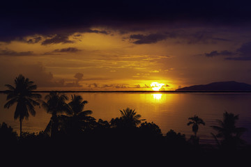 Fototapeta na wymiar silhouette island and sea sunset summer nature background