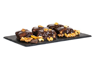 Chocolate raw vegan cake with nuts, figs and carob. Love for a healthy raw food concept.