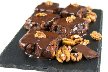 Chocolate raw vegan cake with nuts, figs and carob. Love for a healthy raw food concept.