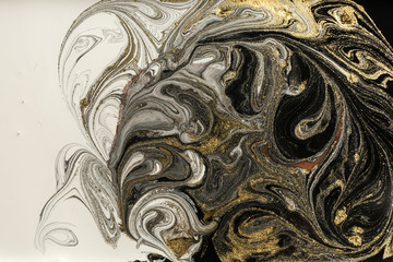 Marble abstract acrylic background. Marbling artwork texture. Agate ripple pattern. Gold powder.