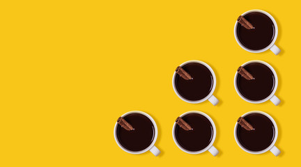 Pattern Hot chocolate cups with cinnamon. Warming winter or autumn drink concept