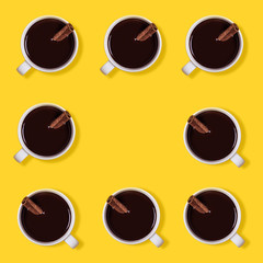 Pattern Hot chocolate cups with cinnamon. Warming winter or autumn drink concept