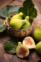 Fresh figs on wooden table