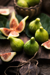 Fresh figs on wooden table