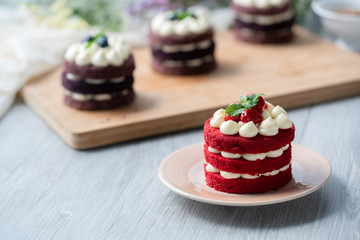 The Red Velvet Cake is placed on a wooden floor. It is suitable for parties in festivals of happiness such as Valentine's Day, Christmas, Happy New Year and a menu that must be in the coffee shop.