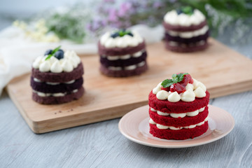 The Red Velvet Cake is placed on a wooden floor. It is suitable for parties in festivals of...