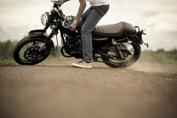 Fototapeta na wymiar Motorcycle or motorbike spot with male rider.