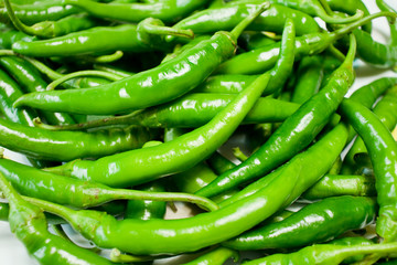 Green chili peppers background.