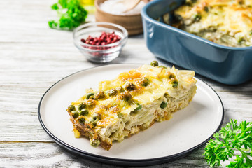 Baked yellow sring beans with parmesan cheese. Selective focus, space for text.
