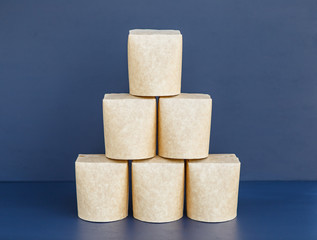 Brown wok containers on the dark background