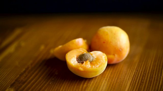 Ripe apricots fruit on wooden table