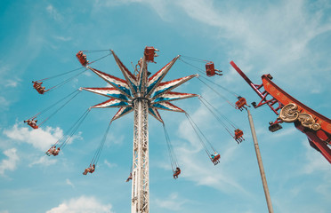 Carousel in amusement park © Claire