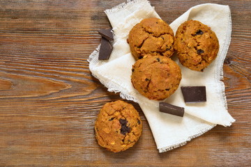 Pumpkin cookies with chocolate chips, top view, copy space