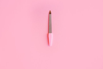 nail file on pink background