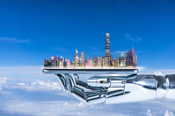 Fototapeta premium city skyline in robot hand