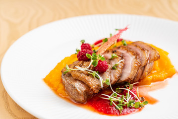 Seared Duck with sweet potato puree.