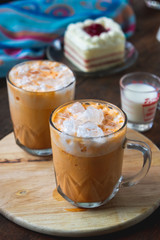 Obraz na płótnie Canvas thai tea milkshank sweet drink on the glass for refreshment