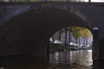 The canal in Amsterdam. Blue sky and bridge in the city. Free space for text