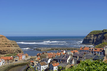 Overlook of the colorful fishing village of Staithes in North Yorkshire, England