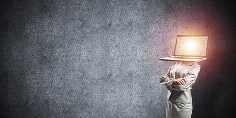 Business woman with laptop instead of head.