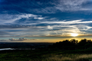 Fototapeta na wymiar Sunsets above the english countryside.