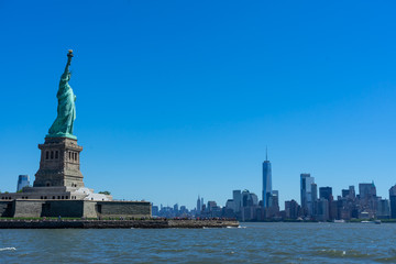 Statue of Liberty Looking Upon Skyline © Brian