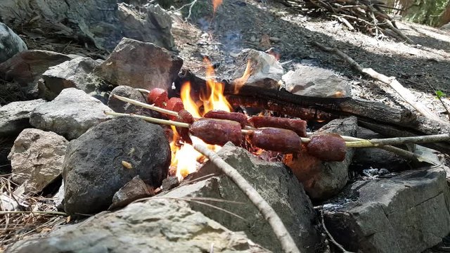 Turkish Sausage (sausage) cooking on fire. 