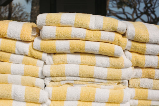Stack of yellow striped towels