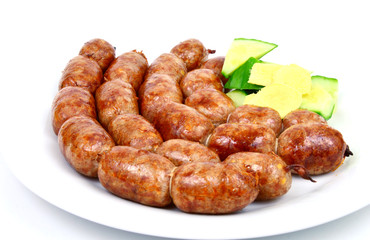 Easten thai sausage (Thai name is Sai Krok Isan) on white background.
ground pork with vermicelli,Rice and garlic  Sausage.