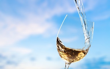 White wine splash isolated on background