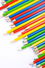  Colorful pencils pattern isolated on white background. Top view colorful of color pencils.Colored pencils, isolated on the white background. Color pencil with copy space isolated on white background,