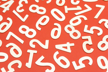 wooden numbers on red paper
