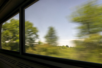 blurred abstract landscape from train window
