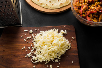 Grated cheese for cooking quesadilla Mexican