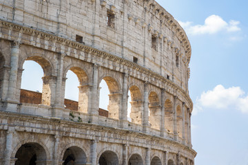 Fototapeta premium Detail of the Colosseum, known as Amphitheatrum Flavium, symbol of the city of Rome, of Italy and one of the seven wonders of the world. In ancient times it was used for gladiatorial shows.