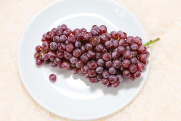 Ripe red grape. isolated on white. With clipping path. Full depth of field.