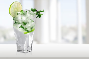 Fresh Mojito cocktail on background