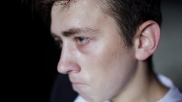 Young man nervously shakes his head