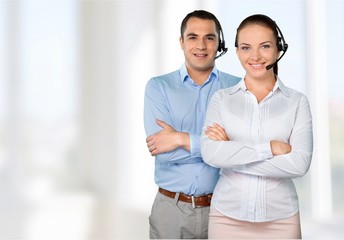 Confident young Business couple with crossed hands