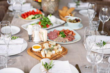 Different meals for the guests on Banquet table. delicious dishes on the table in the restaurant. serving table for birthday or wedding.