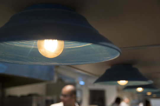 Light bulb ia a blue abajour sequence