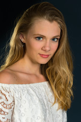 Teenage Girl Posing with Dark Background