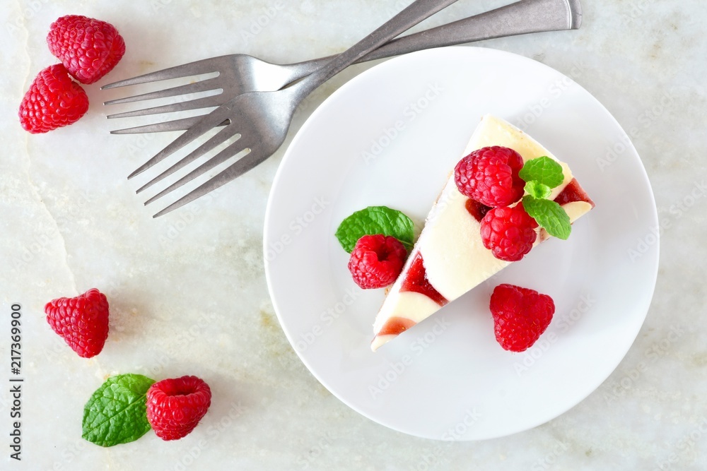 Poster slice of raspberry cheesecake, top view scene over a bright background