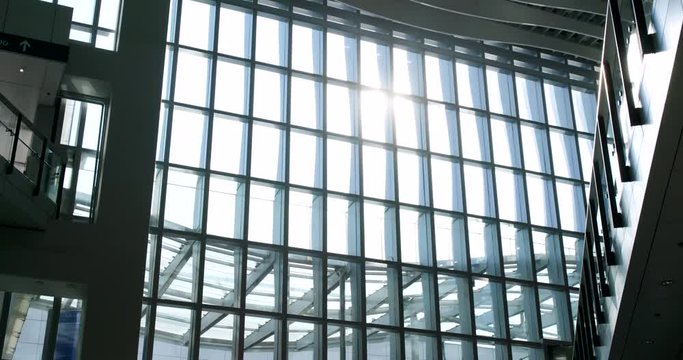 Airport window with sunlight flare