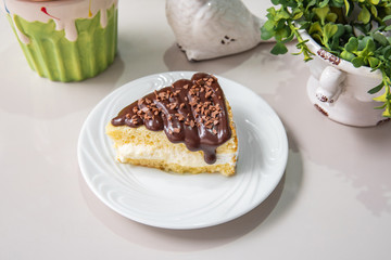 Mini chocolate cake - With plate and white background on a decorated table